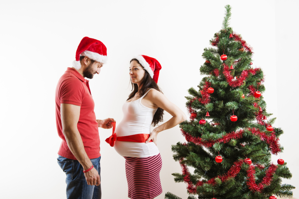 Gift box surprise- Christmas Pregnancy Announcement Photoshoot Ideas